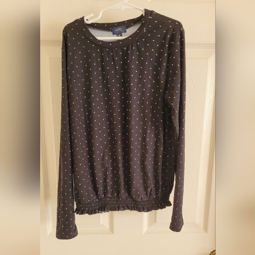 Girl's black with white polka dot size medium shirt.
